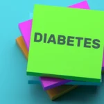 Doctor treating diabetic foot complications in patient.